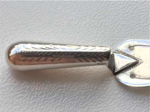 fig 1. A charming Bright Cut silver trowel bookmark.