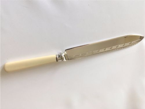 A Good Silver Mounted Cake Knife.