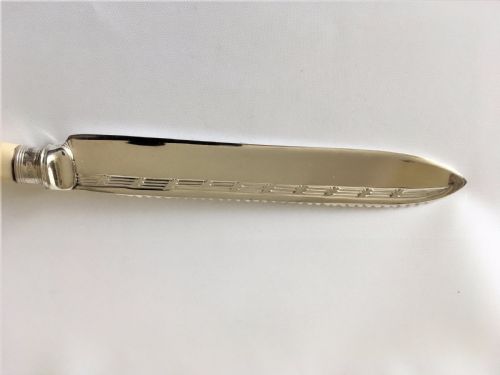 fig 1. A good silver mounted cake knife.