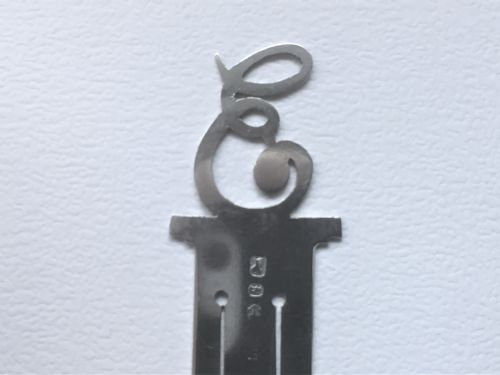 fig 1. A Victorian silver bookmark initial 'E'