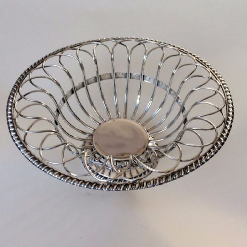 fig 1. A Barnard Brothers silver wire work basket