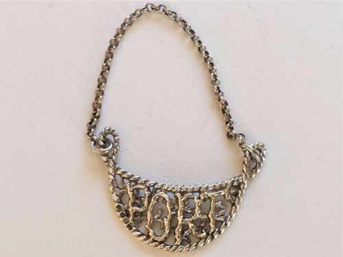 An Unusual Cast Victorian Silver Port Label