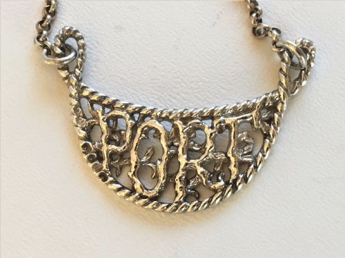 fig 1. An unusual cast Victorian silver Port label