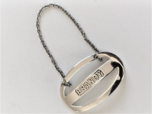 A Superb Samson Morden Silver Brandy Label