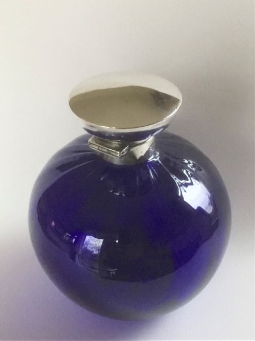 fig 1. A stunning silver mounted Bristol blue cologne bottle