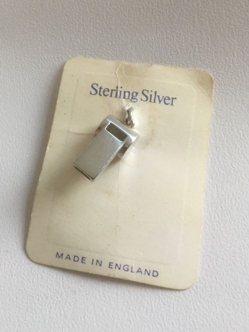 A Miniature Sterling Silver Dog Whistle