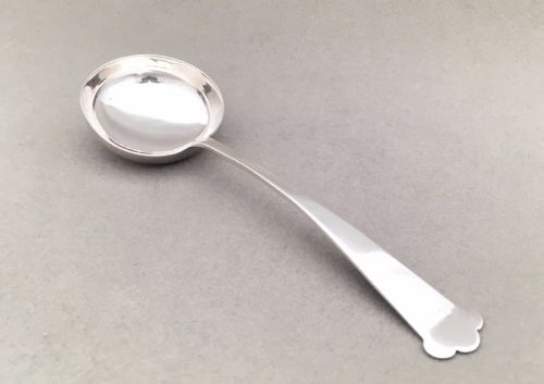 fig 1. An Arts & Crafts style silver cream/sauce ladle