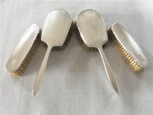 fig 1. A set of four Art Deco silver brushes