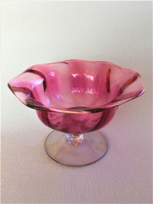 A Victorian Cranberry Wrythen Pedestal Bowl
