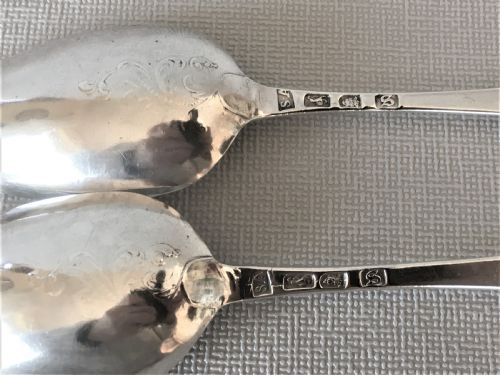 fig 1. A superb pair of 18th Century silver fancy back spoons