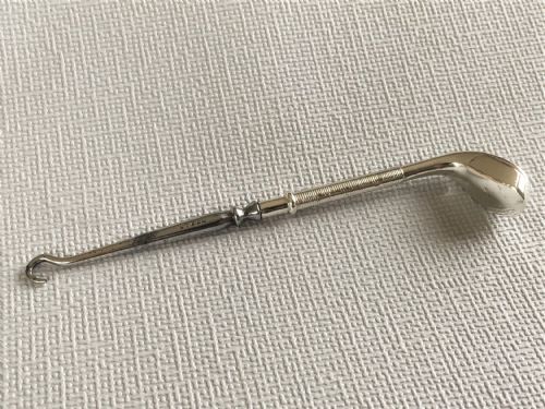 A Rare Silver Golf Club Button Hook