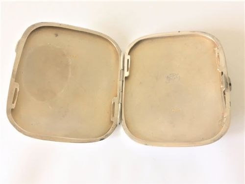 fig 1. An Art Deco silver cigarette/card case