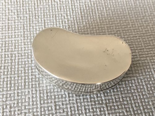 fig 1. An Edwardian silver kidney shaped pillbox