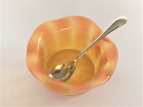 fig 1. A Victorian Vaseline glass salt & silver spoon 