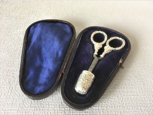 fig 1. A cased pair of Victorian silver sewing scissors & thimble