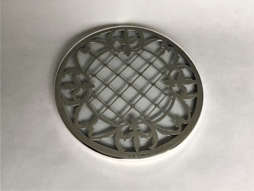 fig 1. A delightful silver mounted teapot stand/coaster