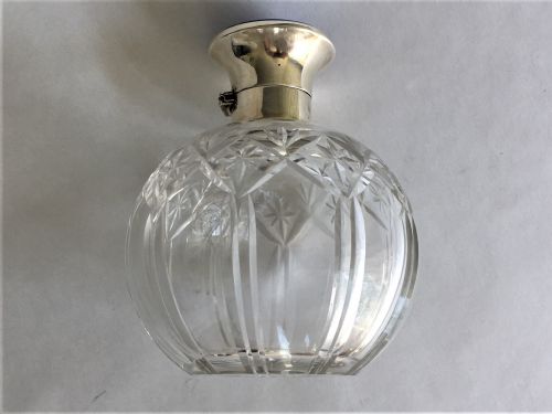 fig 1. A silver & guilloche enamel cologne bottle