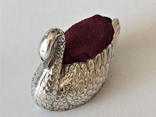 fig 1. An Edwardian silver swan pin cushion