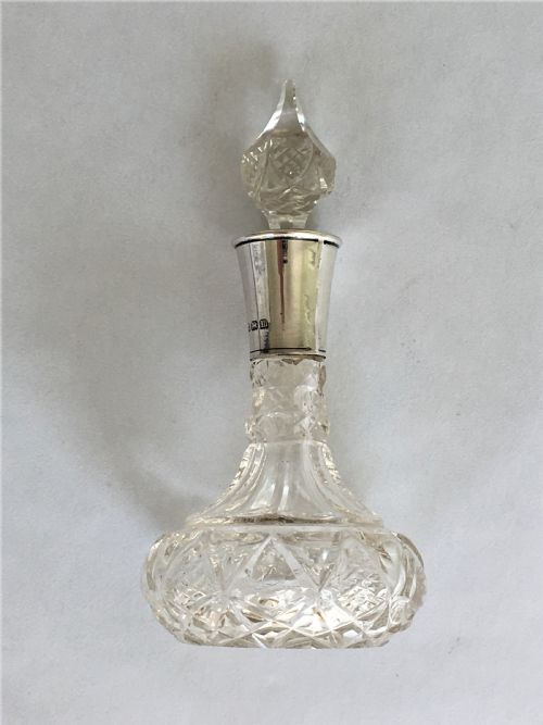 A Small George V Silver Mounted Scent Bottle