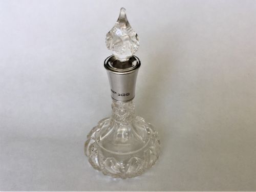 fig 1. A small George V silver mounted scent bottle