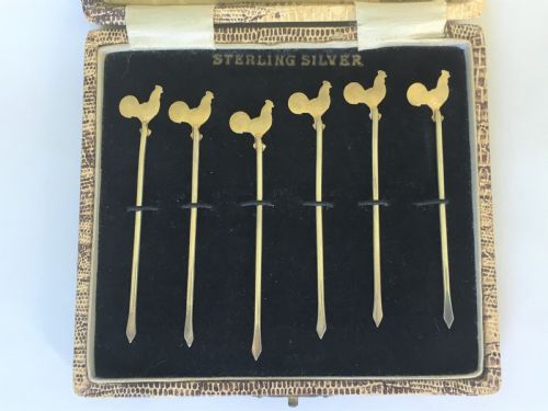A Set of Silver Gilt Cockerel Cocktail Sticks