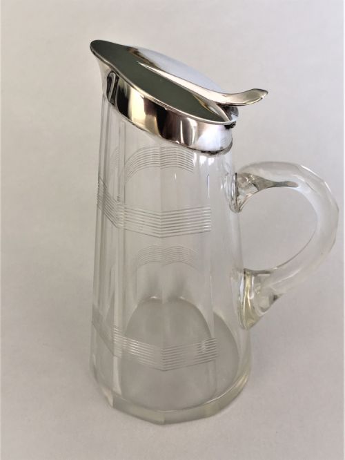 fig 1. A rare Asprey & Co. silver mounted Whisky companion