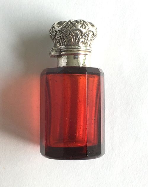 A Victorian Silver Mounted Ruby Scent Bottle