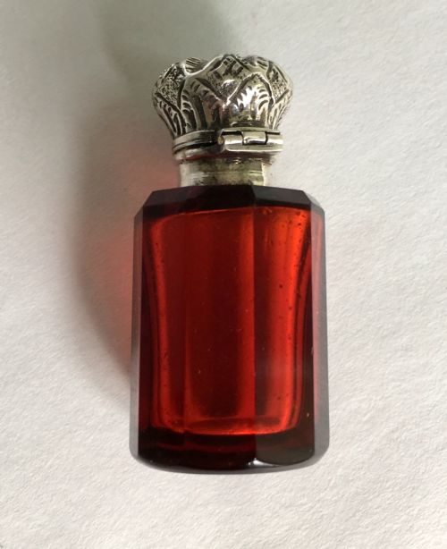 fig 1. A Victorian silver mounted ruby scent bottle
