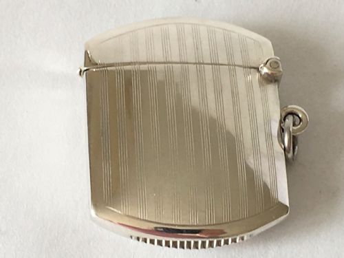 fig 1. A handsome engine turned silver vesta