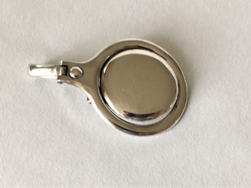 A Patented Sprung Silver Napkin Clip