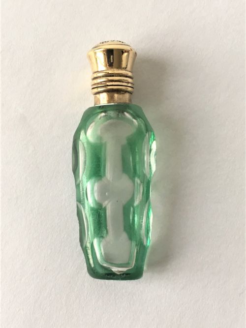 fig 1. A exquisite Victorian overlay scent bottle with gilt mount
