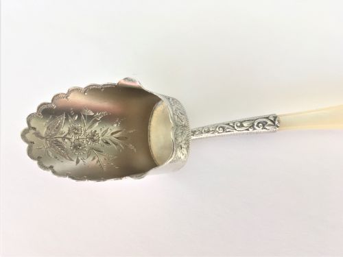 fig 1. A pretty Victorian silver gilt caddy shovel