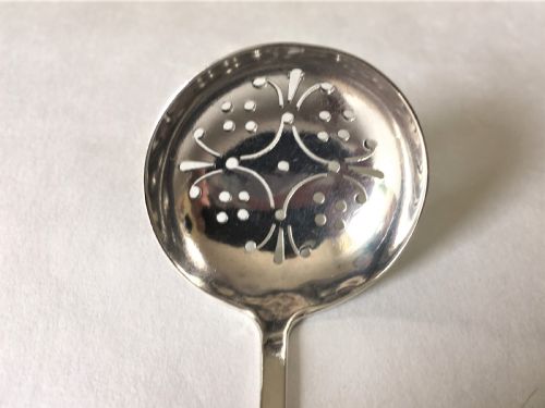 fig 2. A Northwich Arts & Crafts silver sifter spoon