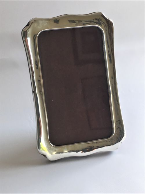 fig 1. A George V silver landscape/portrait photo frame