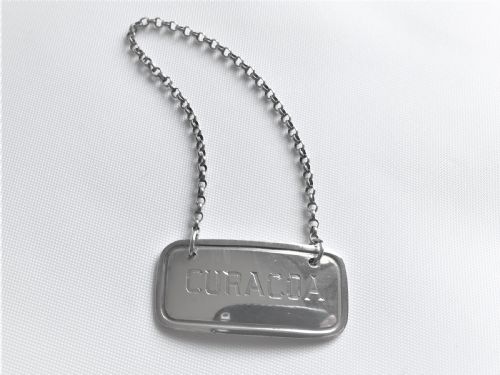 A Rare Edwardian Silver Curacoa Label