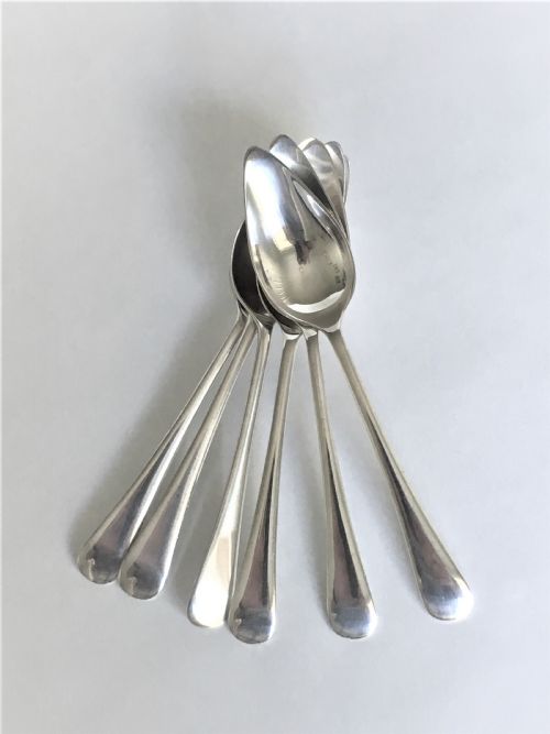 fig 1. A rare set of six silver grapefruit spoons