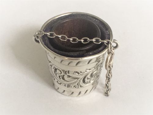 An Edwardian Silver Thimble Bucket and Treen Thimble