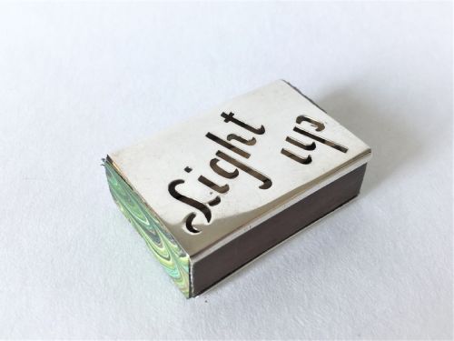 fig 1. A novelty Chester silver match box holder
