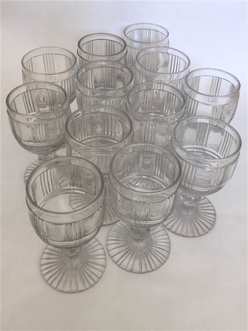 fig 1. A superb suite of 12 cut glass Victorian wine goblets