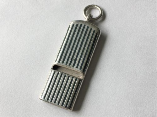 A Rare Silver and Enamel Whistle