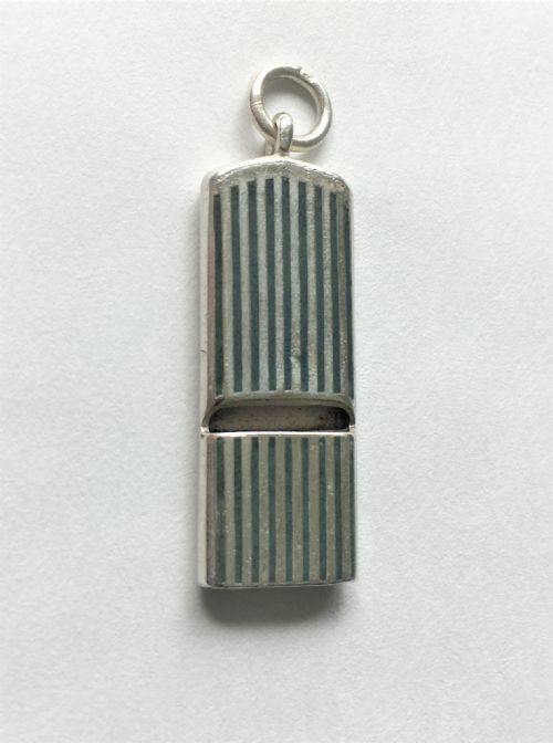 fig 1. A rare silver and enamel whistle