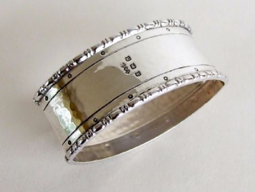 fig 1. A Liberty & Co. Arts & Crafts silver napkin ring
