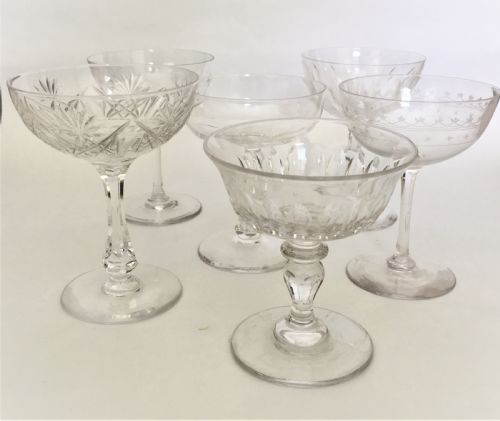 fig 1. A harlequin set of 6 cut and etched champagne bowls