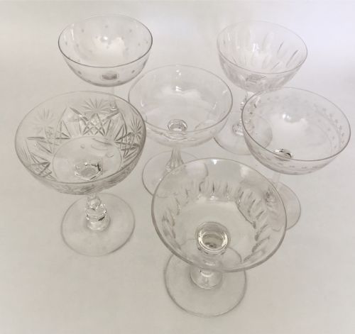 fig 2. A harlequin set of 6 cut and etched champagne bowls