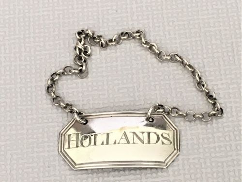 A Lovely Georgian Silver 'Hollands' Decanter Label