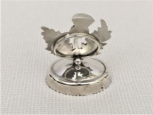 fig 1. A Scottish themed silver menu/name card holder