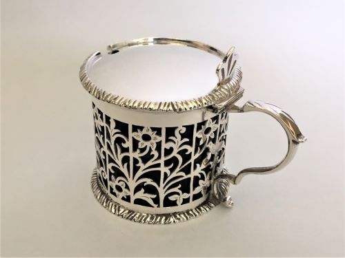 fig 1. A superb pierced silver mustard pot with birds & flowers
