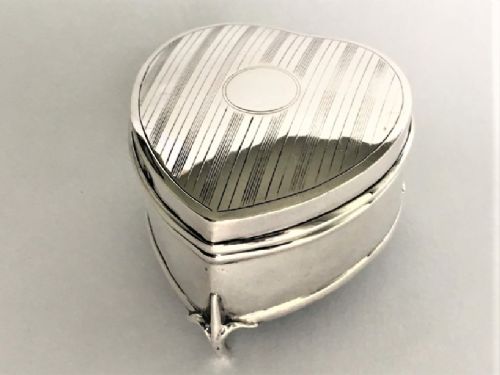fig 1. A charming silver heart shaped trinket box