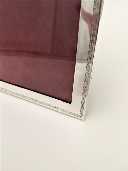 fig 1. A fine portrait/landscape silver photo frame