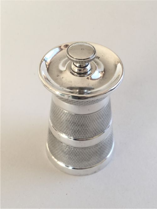 fig 1. A handsome Art Deco silver pepper grinder